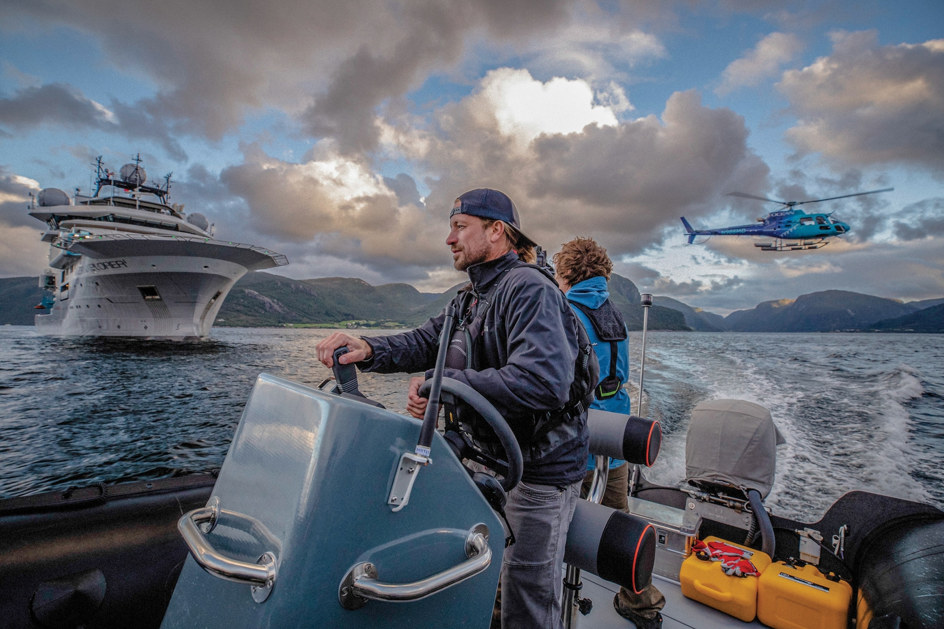 Derek McQuigg controlling a small craft.